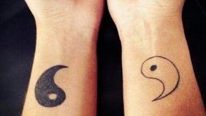 ying yang couple tattoos